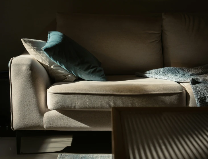 a couch sitting inside of a living room