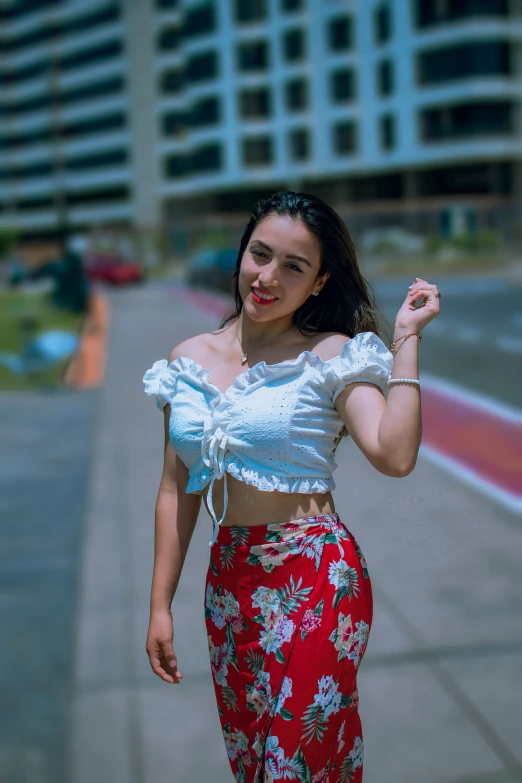 a young woman smiles and poses for the camera