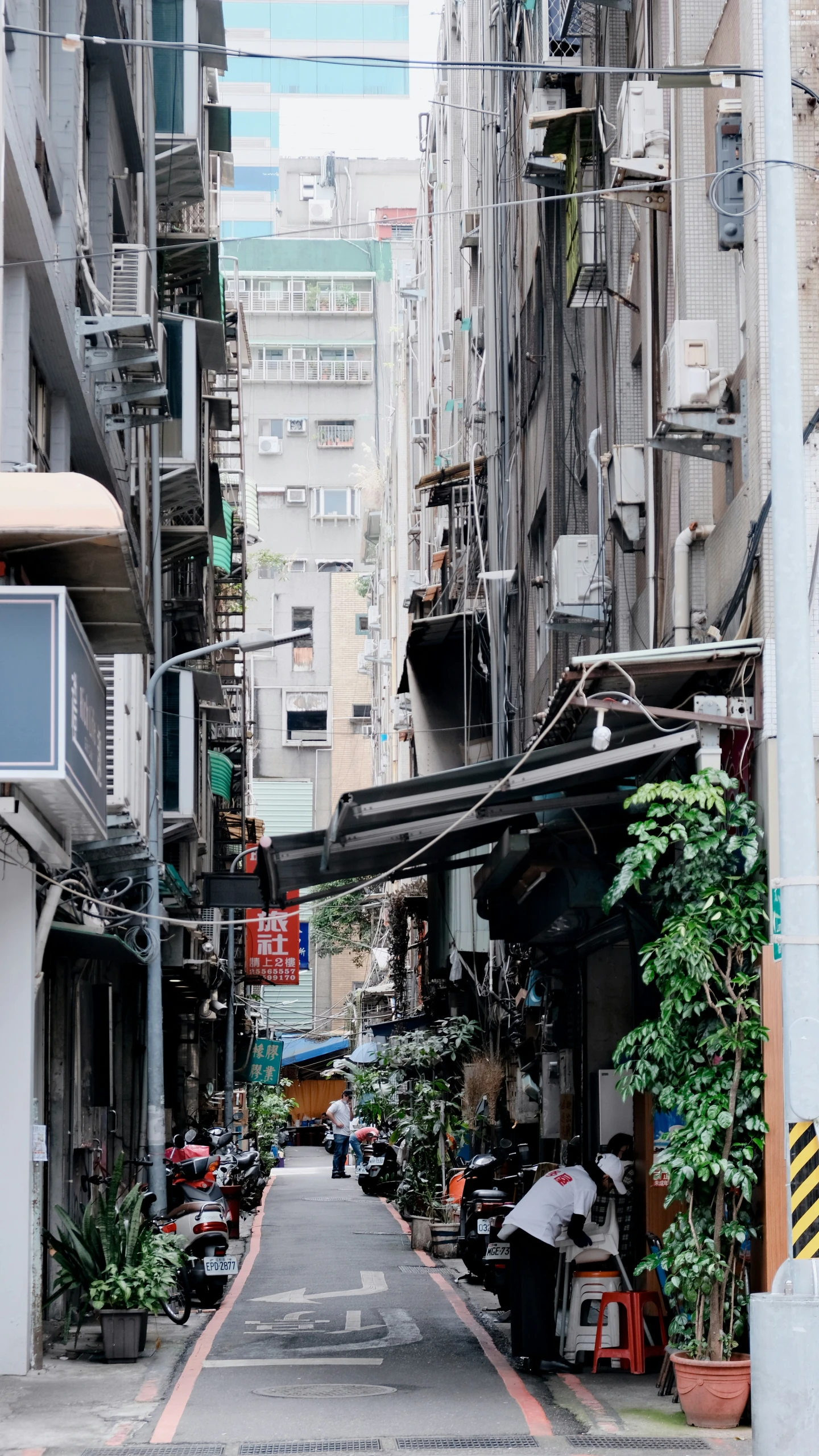 an alley with many buildings on it