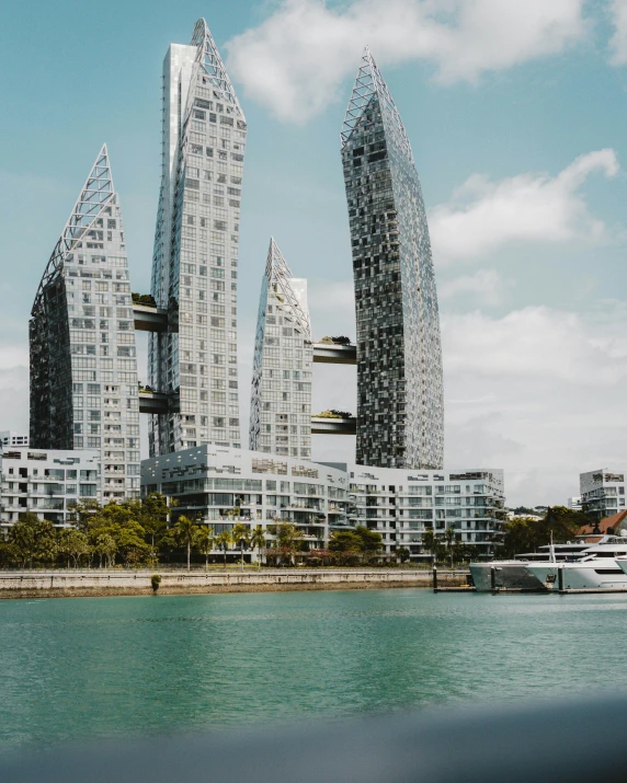 the futuristic city is built on land and has been surrounded by water