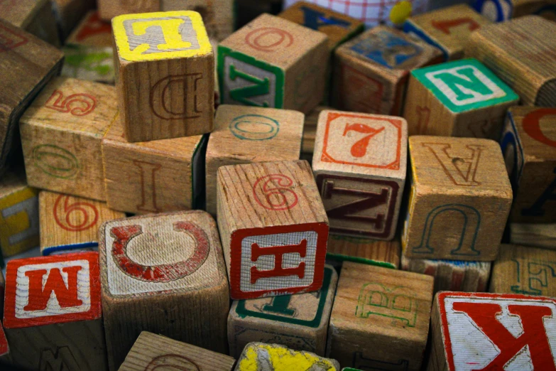 the alphabet block are spelled with various colors