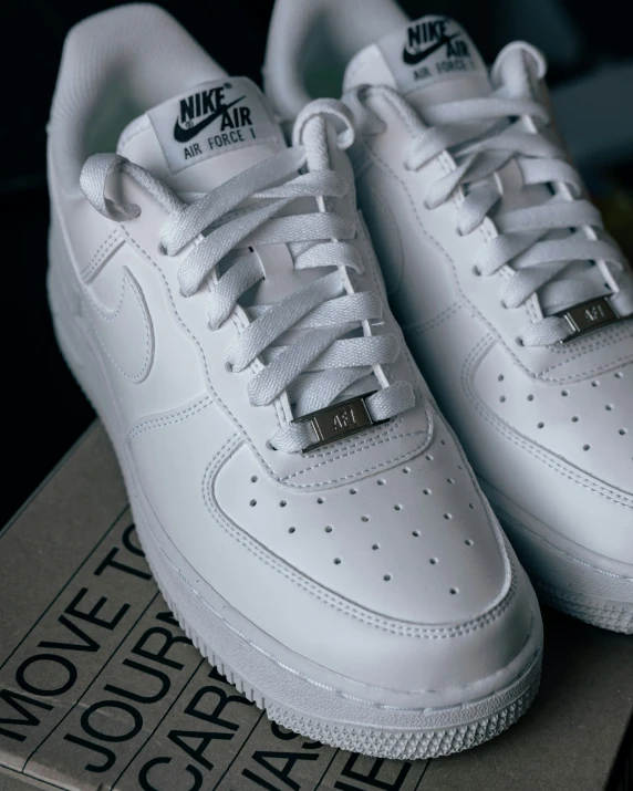 white nike air force shoes that are still in the box