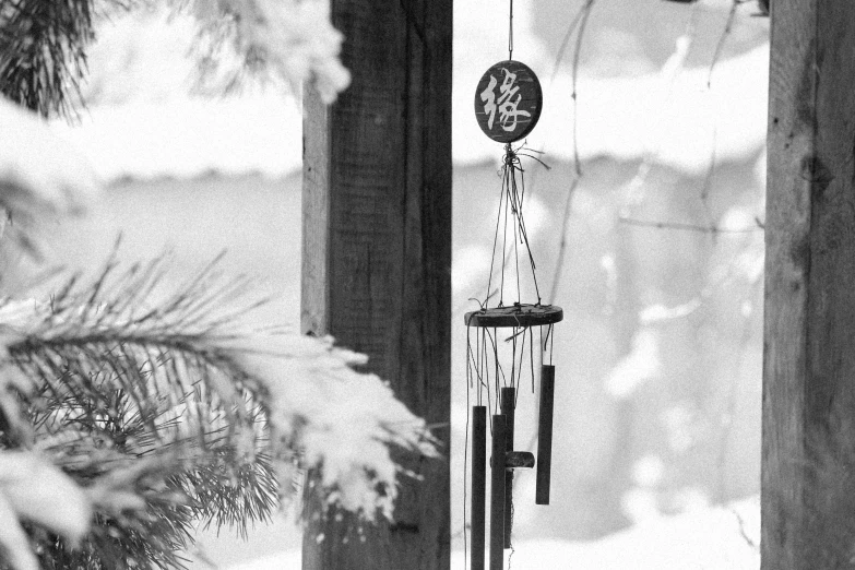 a group of bells attached to poles and some snow