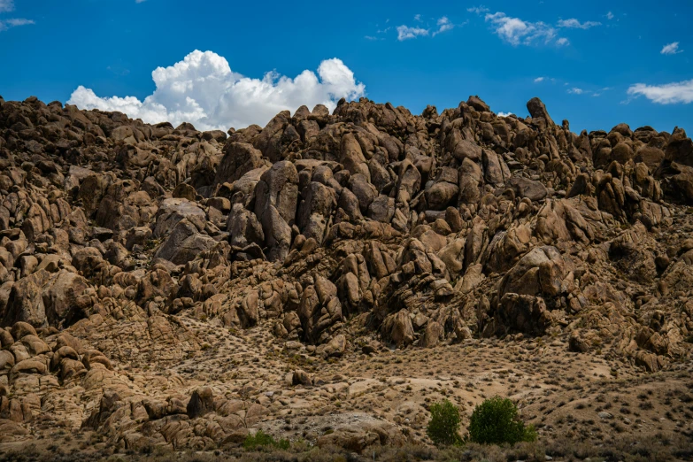 a rocky slope in the middle of a desert