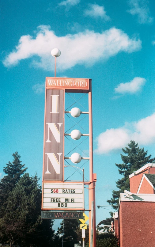 a neon sign for a local public theater