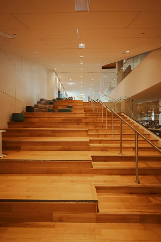 several steps leading up to a lobby and elevators