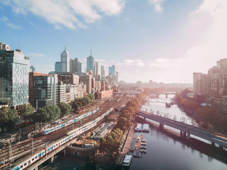 an image of an urban setting with a bridge in the background