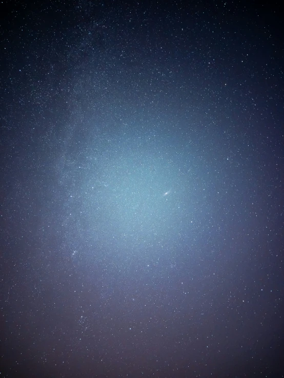 a group of people are looking at the stars