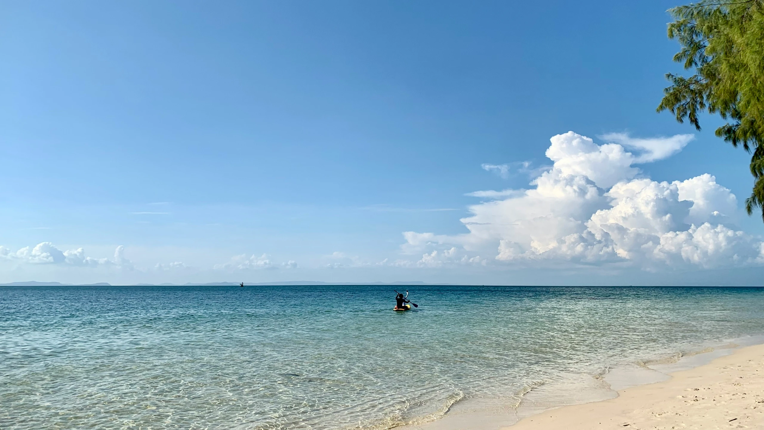 the water is calm and very clear on the beach