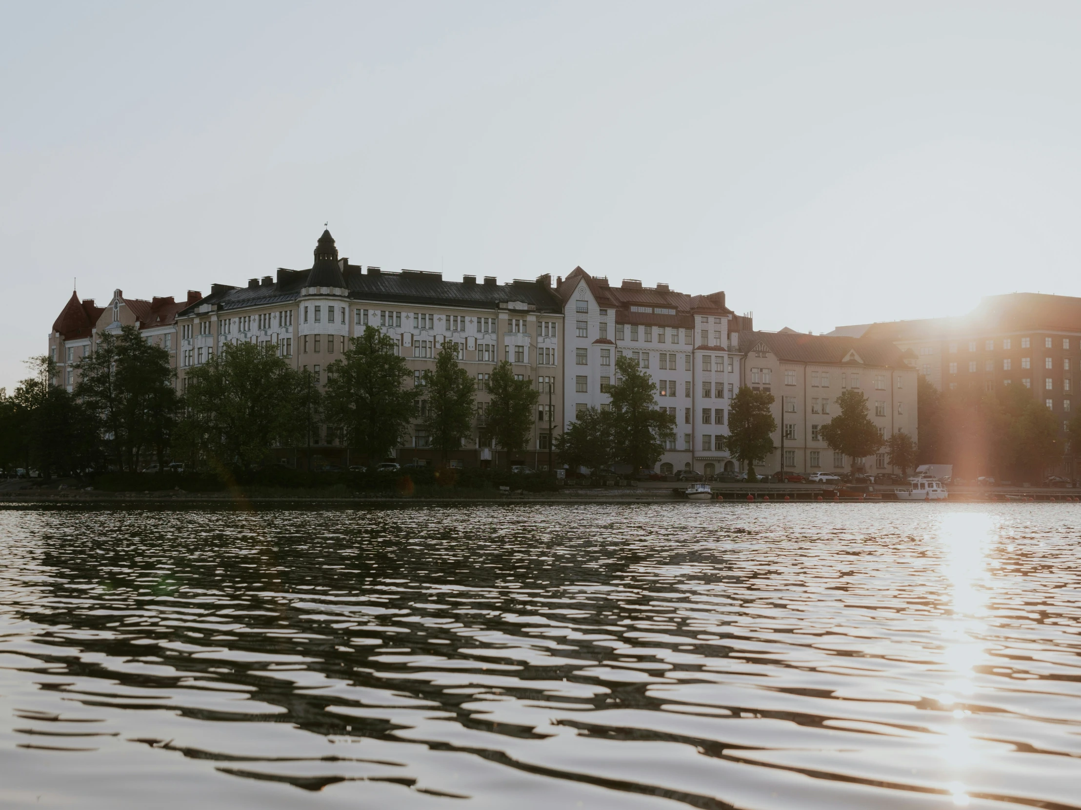 some building are shown next to the water