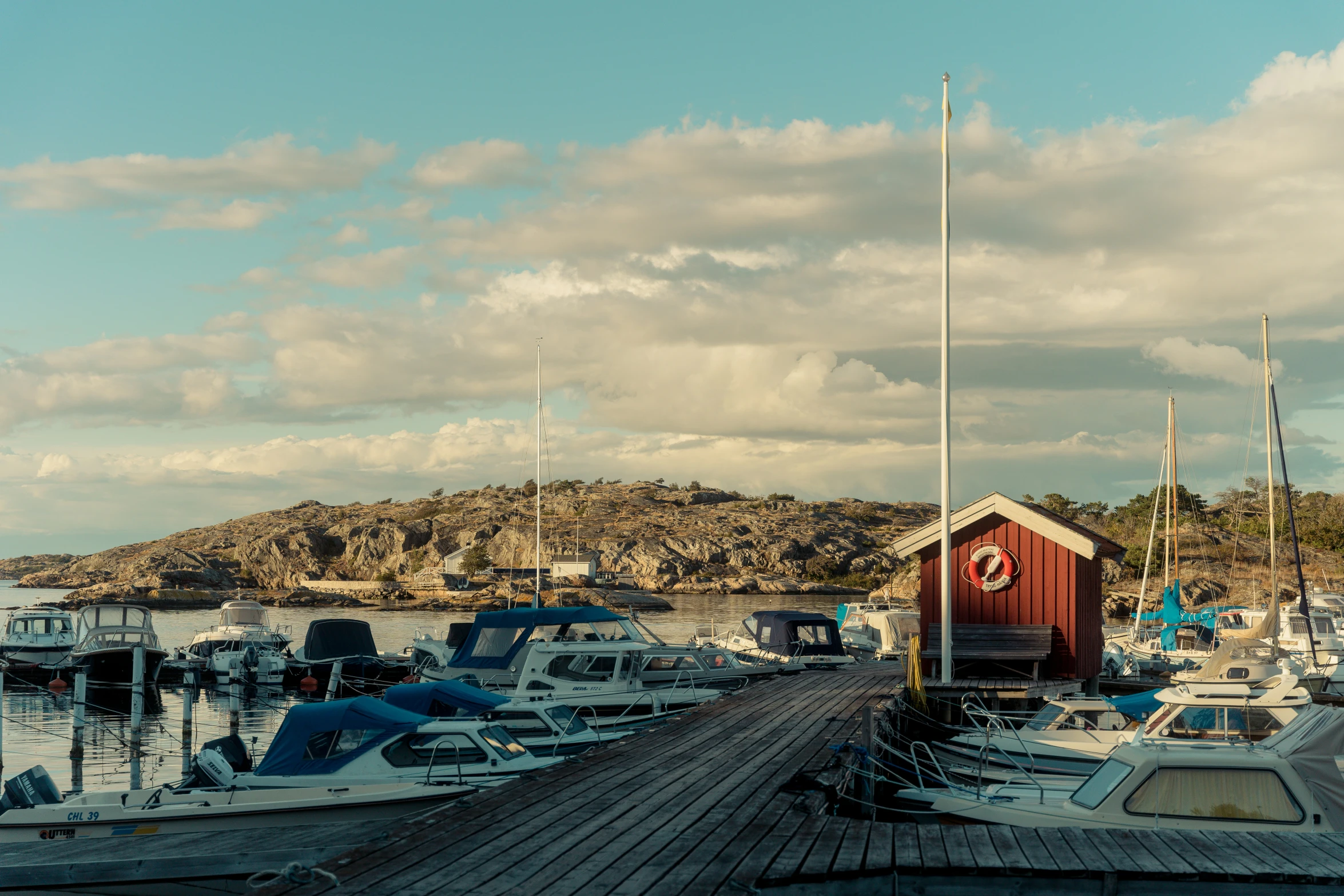 an over head view of some boats at a marina