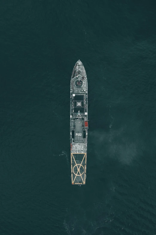 a boat is seen in the ocean near a tower