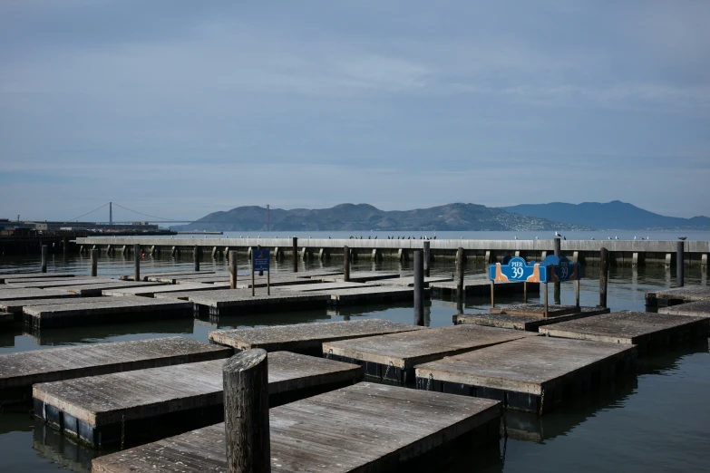 a few piers that are next to some water