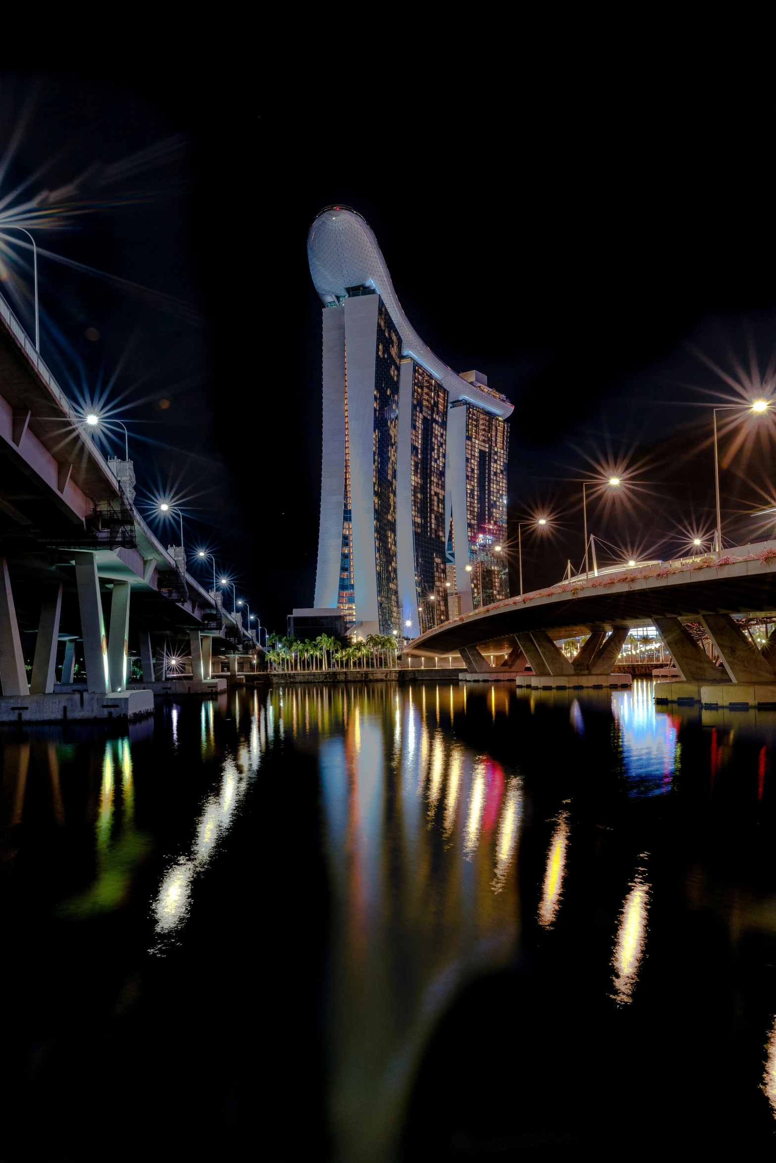 an night time view of a city on the water