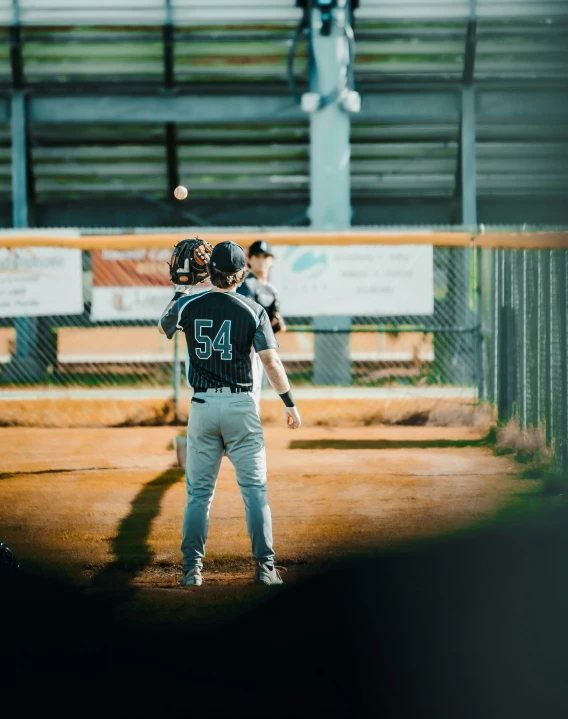 three baseball players are playing on the field