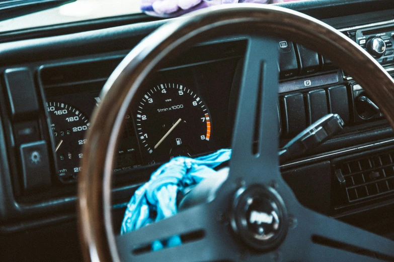 a steering wheel and dashboard in a car