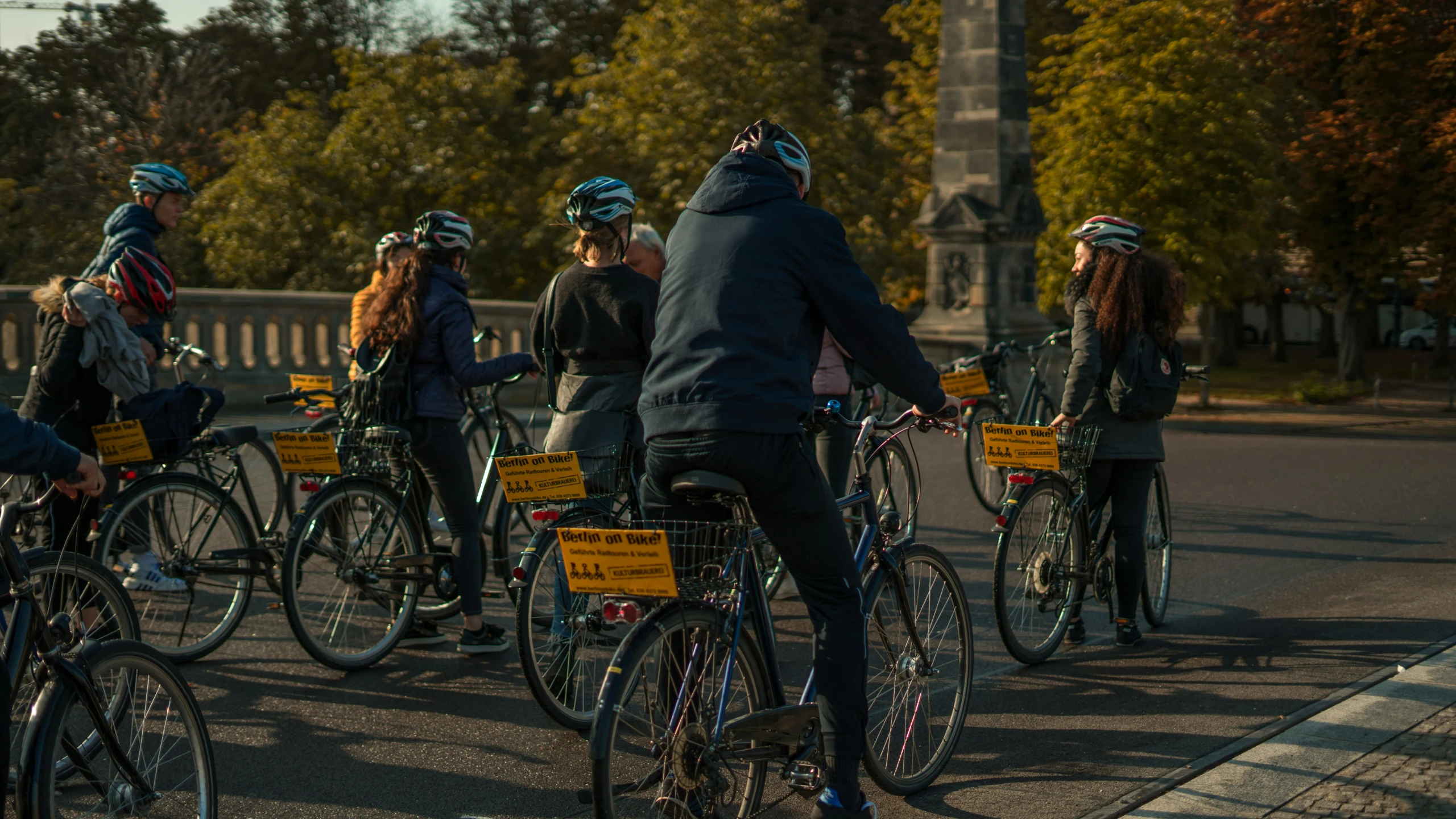 a group of people on bikes at a bike path