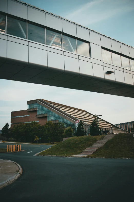 the top part of a modern building with several windows