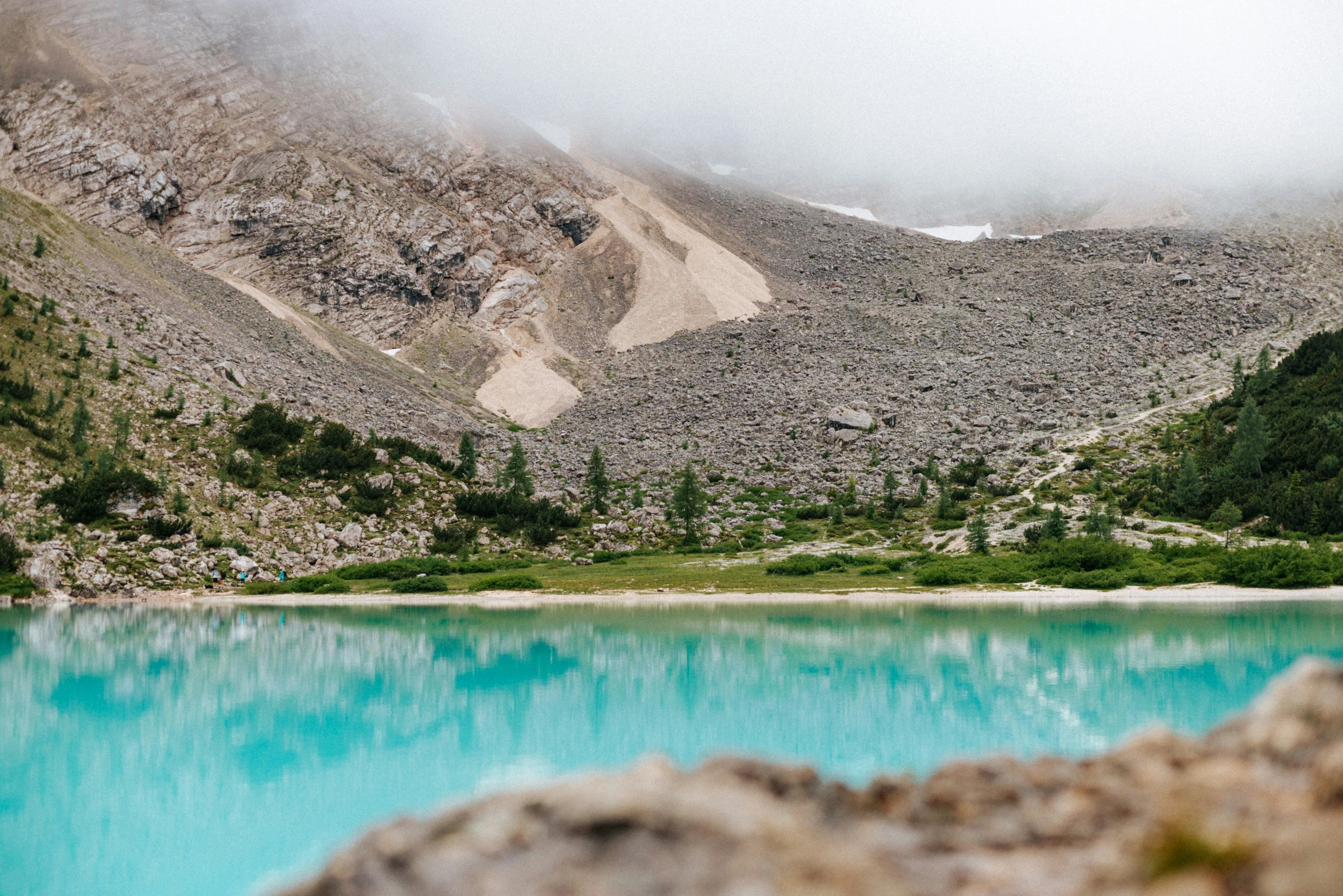 there are some mountains with water below