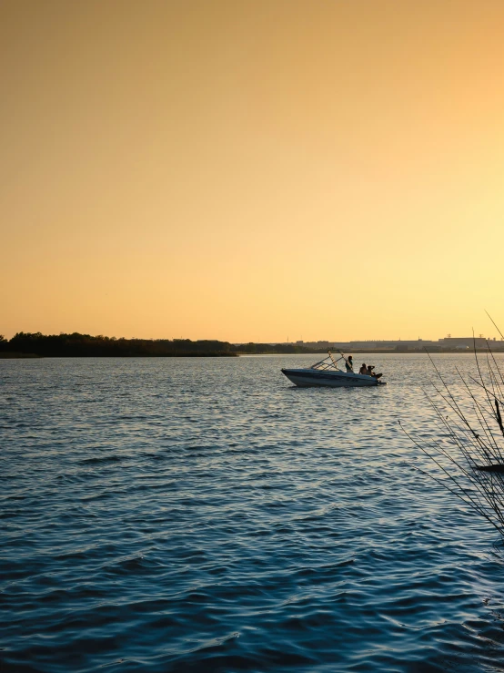 two boats are out in the open water