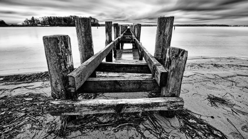 a dock in a lake that is very rough