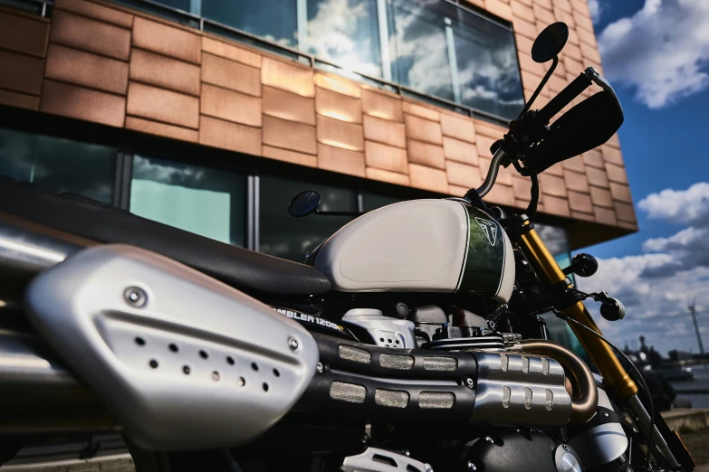 a motorcycle that is outside of a building