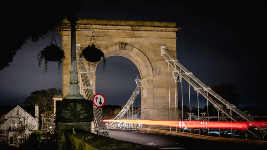 long exposure pograph of an old bridge at night