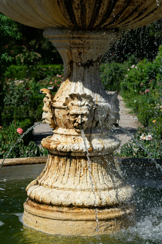 a fountain is seen with a large splash of water