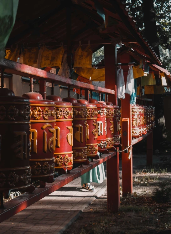 old chests are stored next to an open pavilion