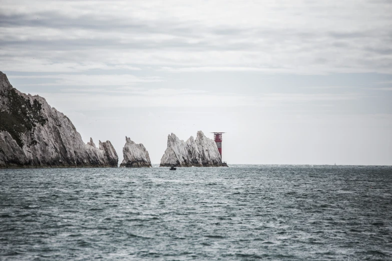 an island with many rocks sticking out of the water