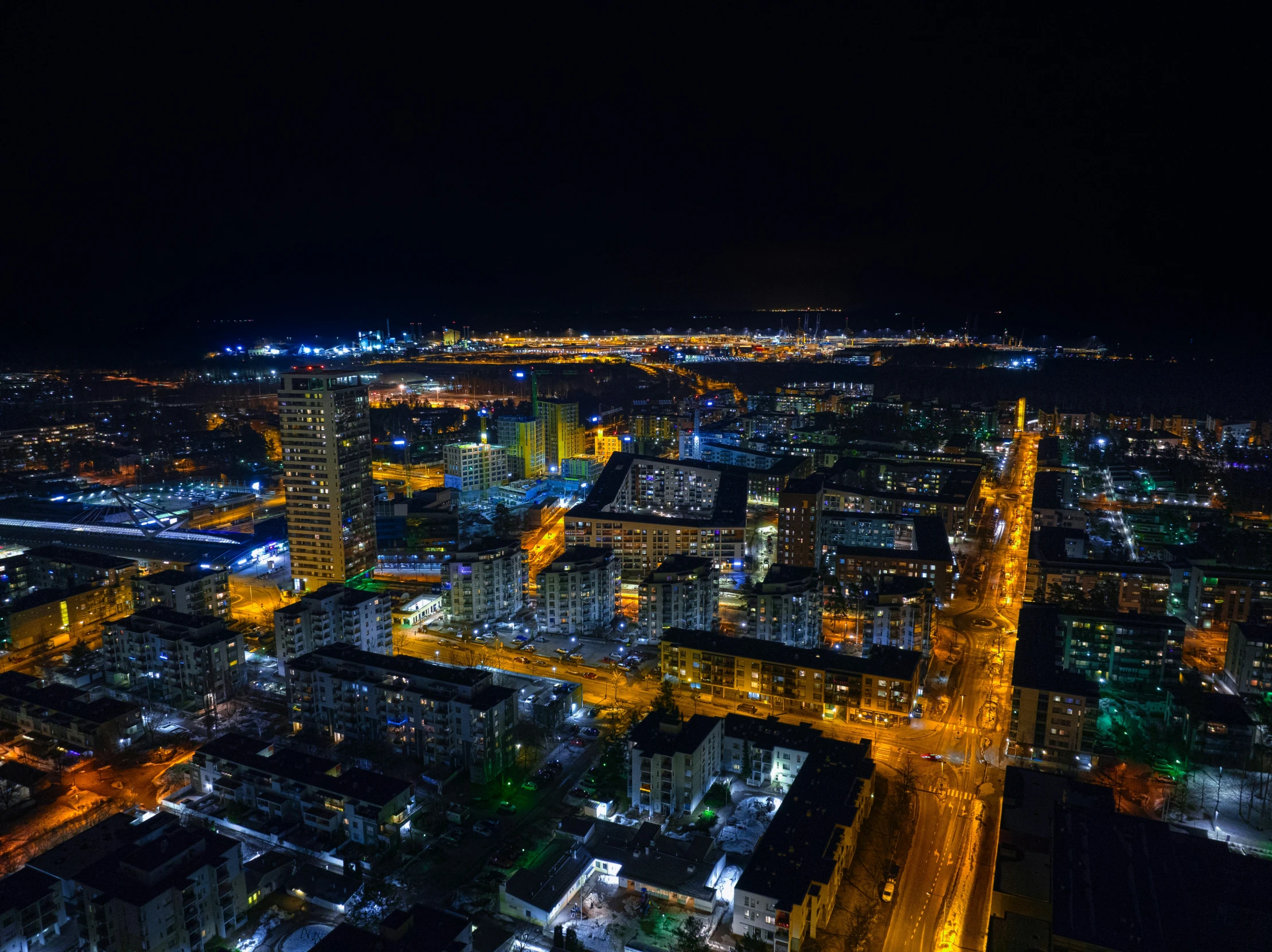 a night scene looking out over an urban area