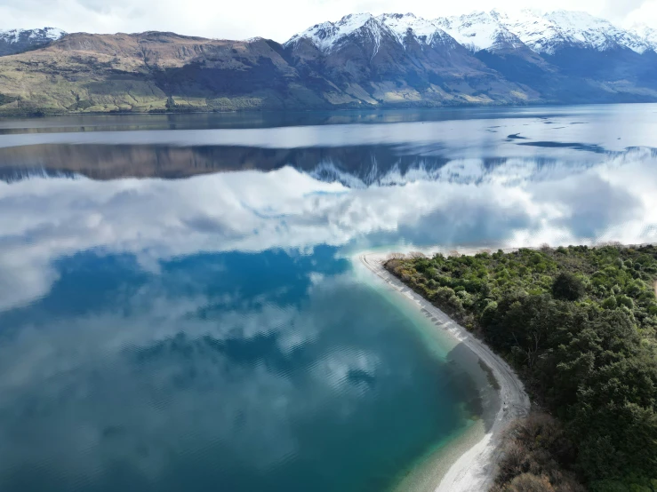 the view of the water's reflection in the clear blue water