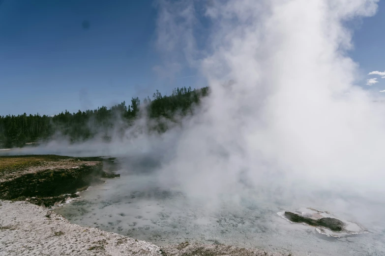 an image of an open air space with water and steam