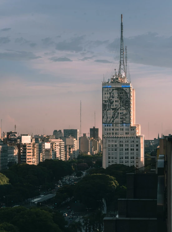 a city skyline with tall buildings and a clock tower