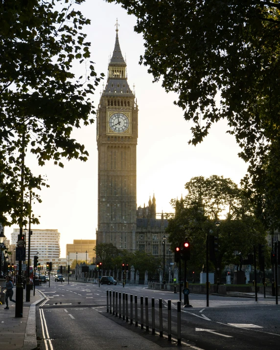 big ben in the background, as seen from a quiet road