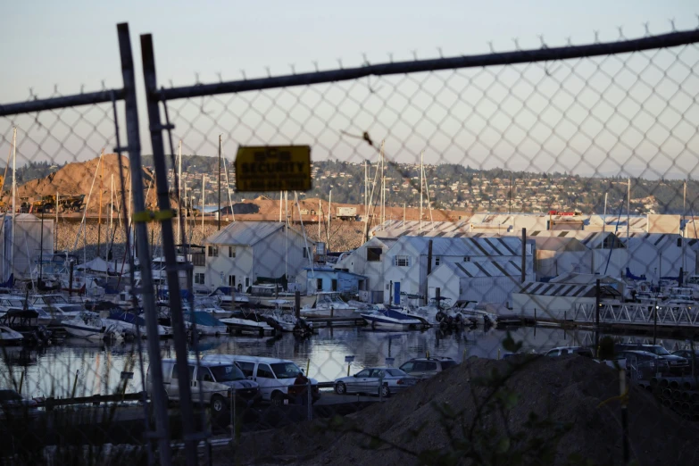 view of a marina through a fence