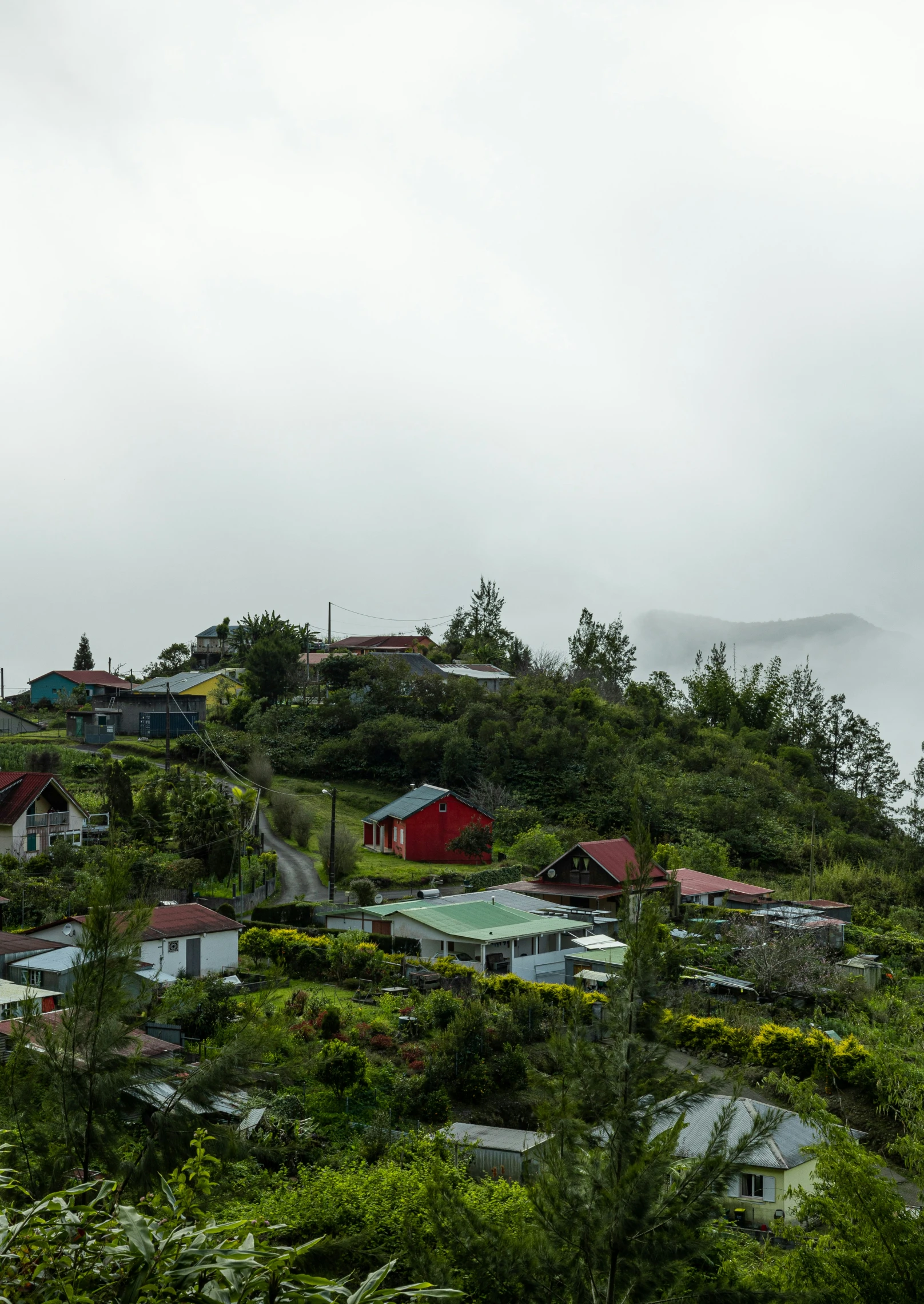 this is a small village with houses nestled on a hill