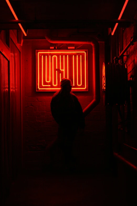 a man that is standing in a hallway