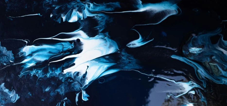 there is an image of liquid painted in black and blue