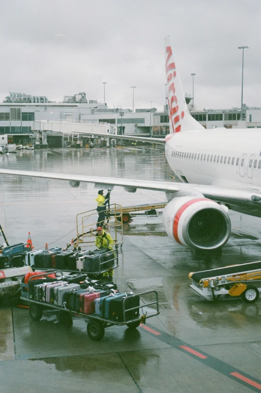 the crew prepares an airplane for its flight