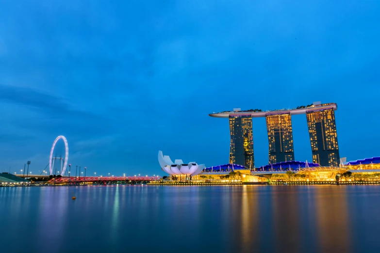 some buildings and some water and lights