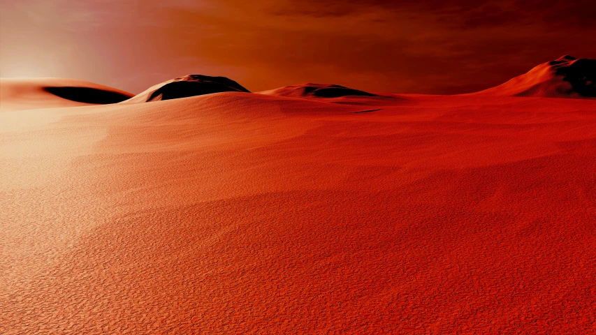 the sand on the desert is red while the sky has orange