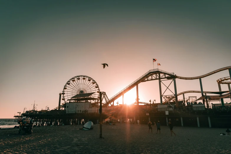 a ride sits on the beach at sunset