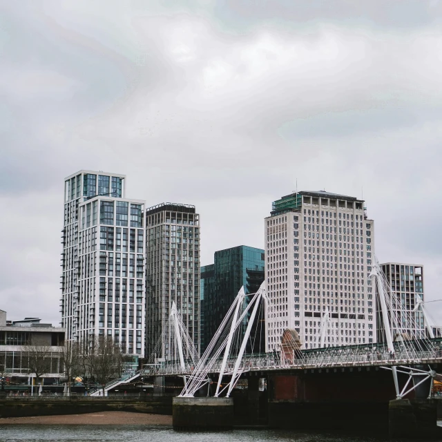 the building next to the bridge are tall