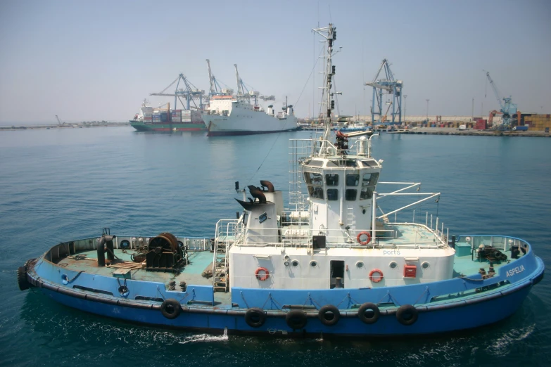 a large boat in the ocean during the day