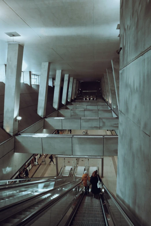 a set of escalators in an open building