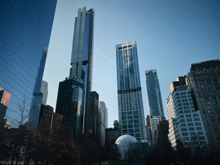 a large group of skyscrs towering over a city