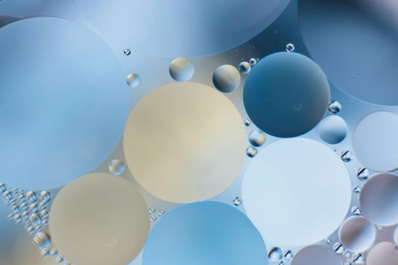 colorful objects displayed in closeup with water droplets