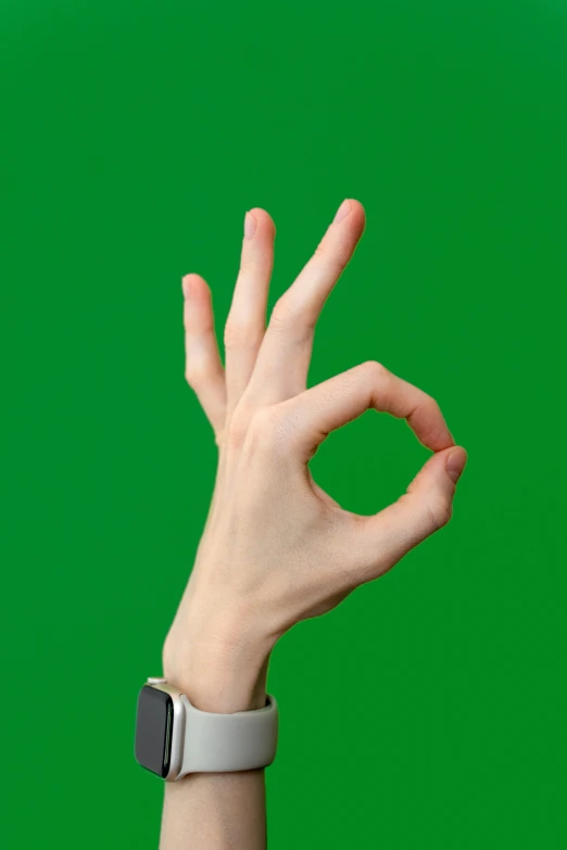 a hand making the v with their fingers