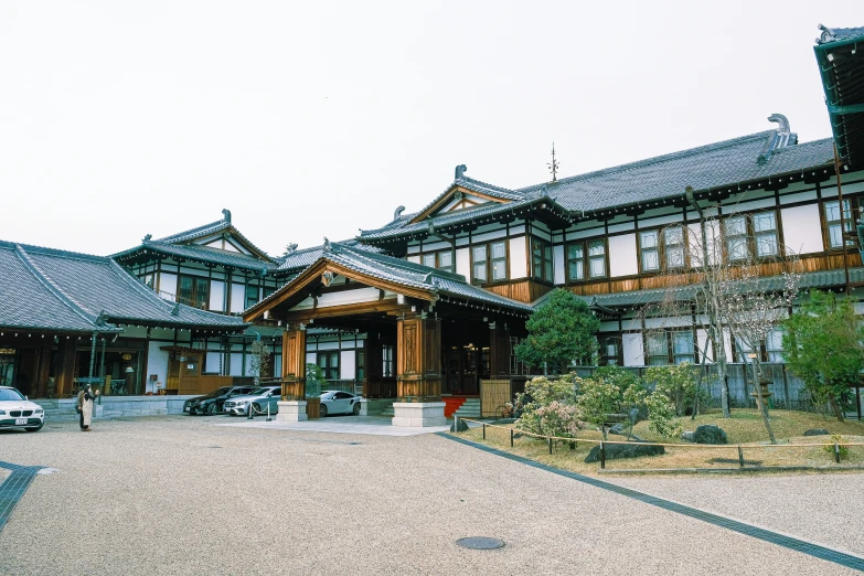 a large, old - fashioned building in the country side